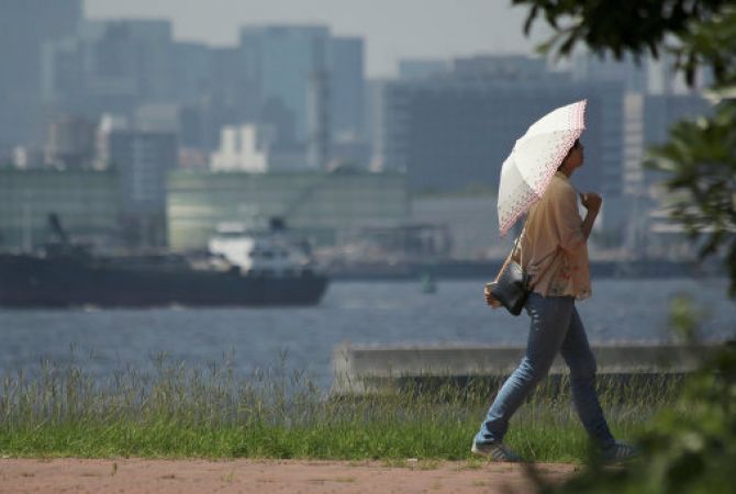 Four people dead and thousands hospitalized as Japan is hit by hottest day of summer