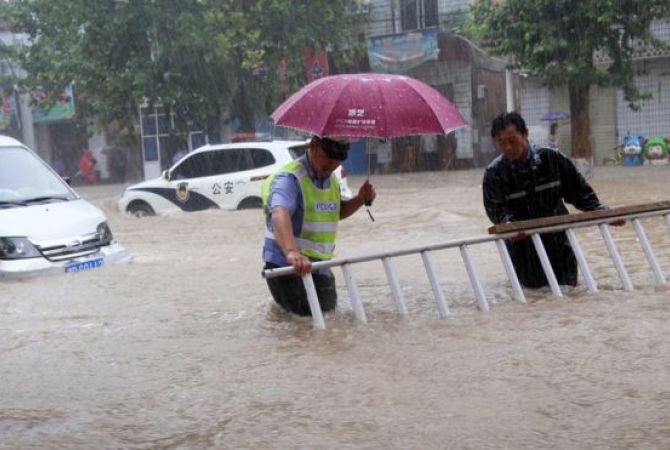 По меньшей мере 78 человек погибли с начала этой недели в результате наводнения в 
Китае
