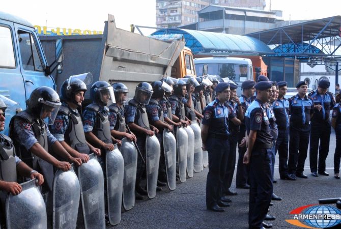 Police warn demonstrators, disperse illegal rally 