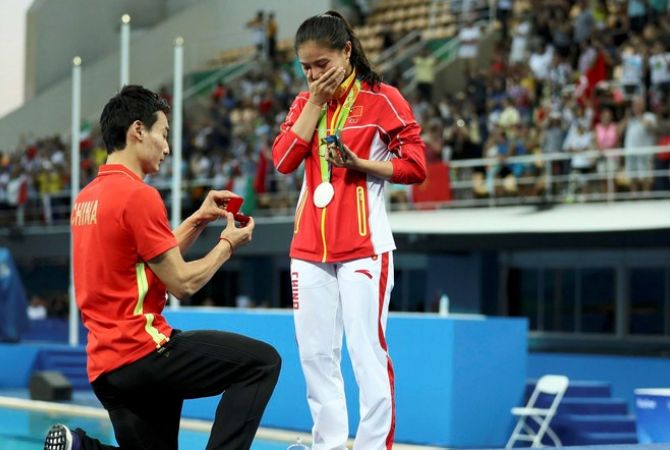 Olympic Romance - In twist, Chinese divers get engaged on Olympic medal stage