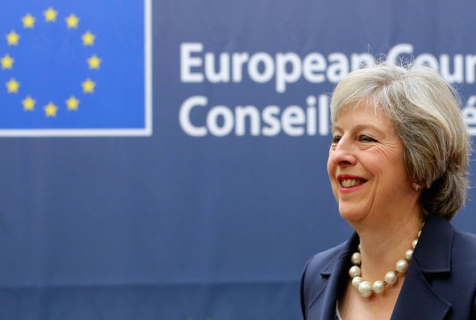 Theresa May expects full EU role until Brexit