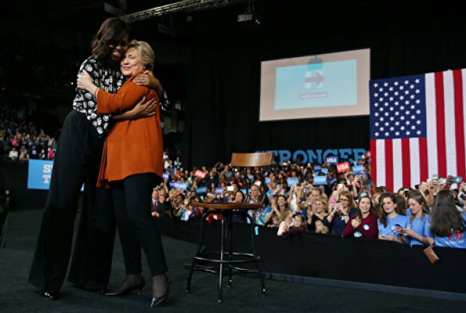 US election 2016: Michelle Obama campaigns with her 'girl' Hillary Clinton
