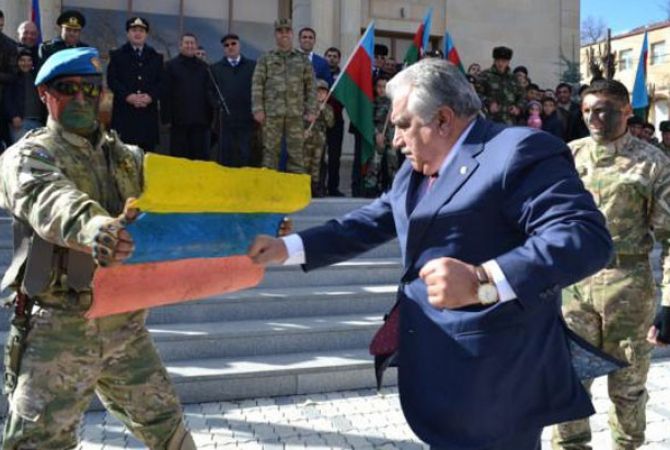 Azerbaijani official destroys Colombian flag taking it for Armenian – undisputable example of 
xenophobia   