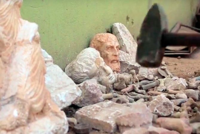 IS militants destroy archeological statues in Syria’s Dura-Europos