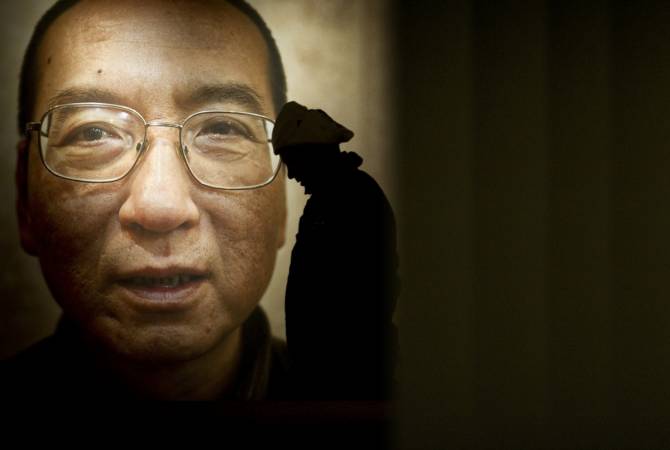 В Китае нобелевского лауреата освободили из тюрьмы из-за неизлечимого заболевания