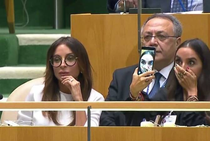 Leyla Aliyeva taking selfies during his father’s speech at UN General Assembly