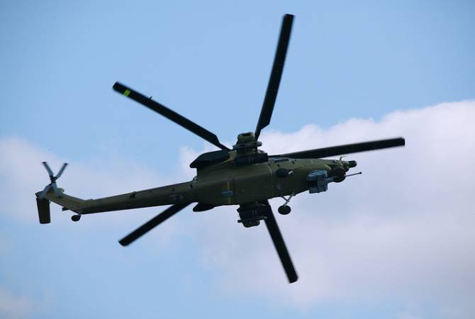 Минобороны РФ опровергает информацию о том, что боевики в Сирии сбили российский 
вертолет
