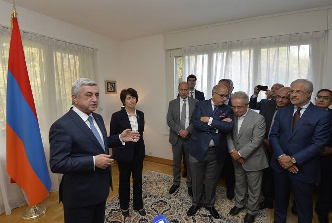 President Sargsyan presents results of Geneva talks at meeting with Armenian community of 
Switzerland