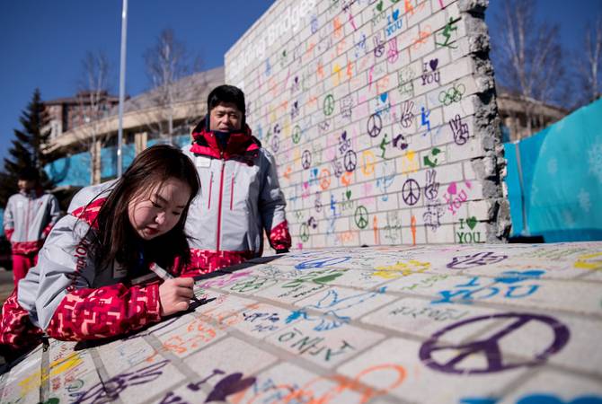 IOC President inaugurates Truce Wall in PyeongChang Olympic Village 