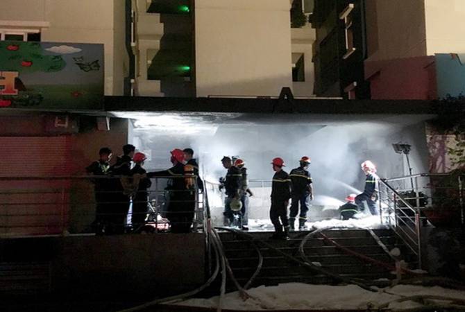 13 dead in Vietnam apartment fire 