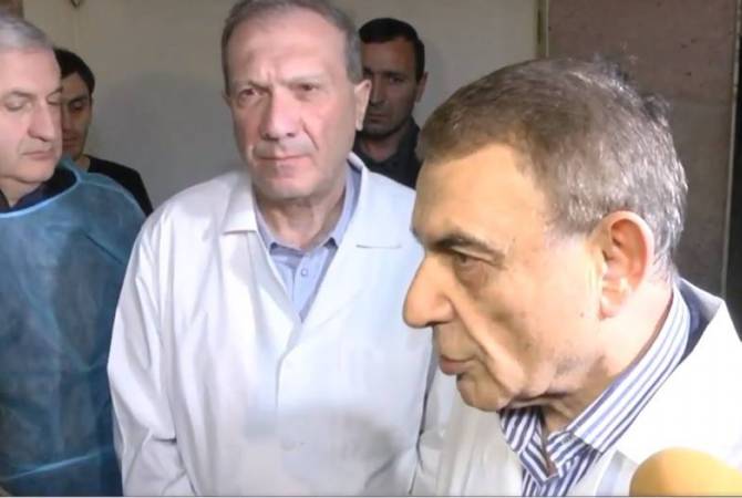 Duty call: Speaker of Parliament Ara Babloyan once again wears white coat to visit Yerevan 
explosion victims as pediatric surgeon 