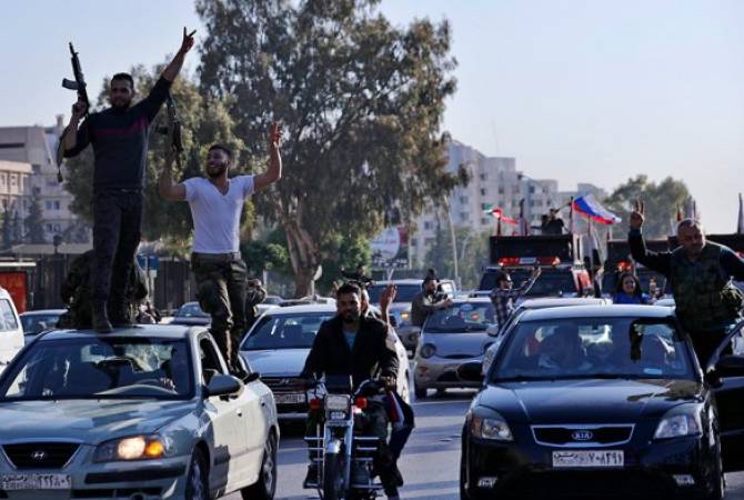 Syrians hold rallies in Damascus in support of President Assad after US missile strikes