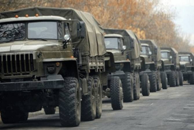 Street-blocking tactic of demonstrators causes on-duty military convoy to be blocked in traffic 
jam - report