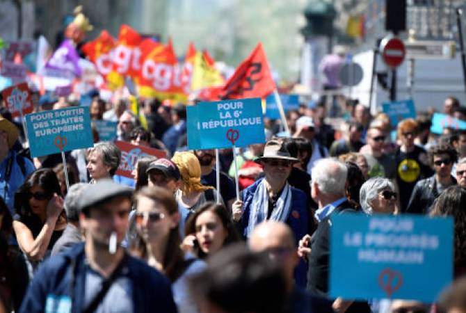 Thousands rally against Macron in Paris