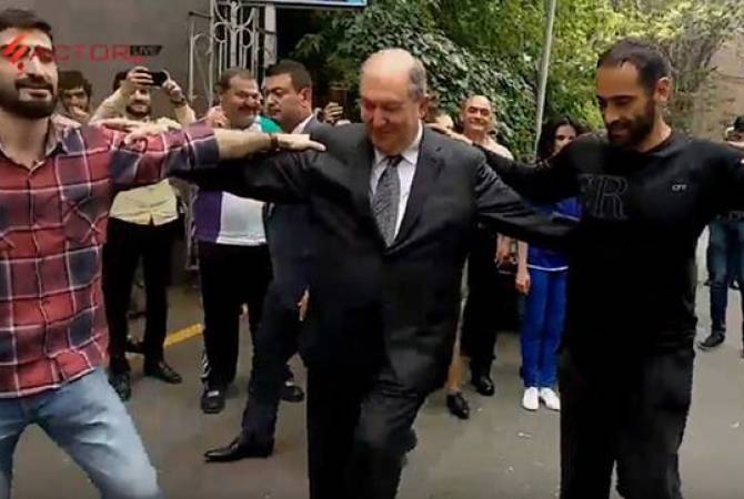 WATCH: Armenia’s charismatic president deals with demonstrations in total swag – all smiles 
and joy as President Sarkissian grooves to folk music with protesters