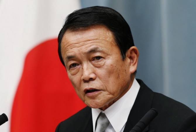 СМИ: японский министр финансов вернет годовую зарплату из-за скандала в его 
ведомстве