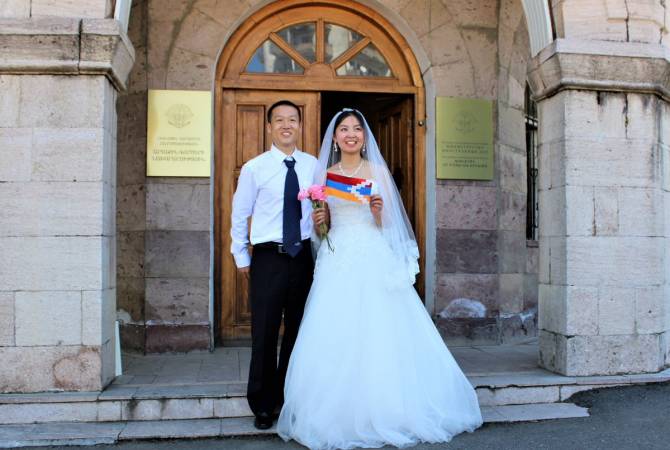 Newlywed foreigners arrive in Stepanakert, Artsakh with bride still in wedding dress for 
honeymoon 