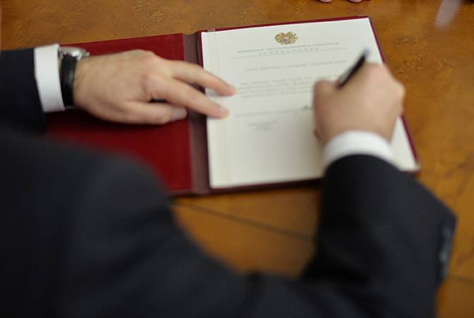 President Sarkissian signs law adopted by Parliament