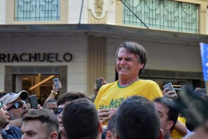 Brazilian presidential candidate Jair Bolsonaro stabbed at rally