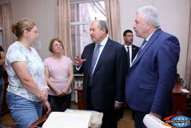 President Sarkissian donates rare Armenian Genocide photographs from personal collection to 
national archive 
