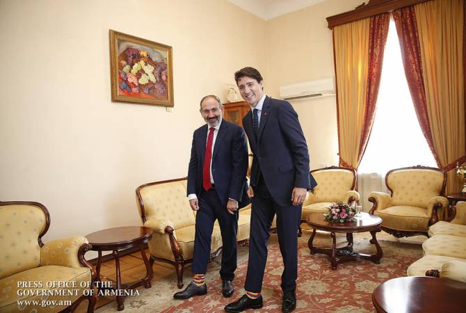 New Bromance: Buddies Pashinyan and Trudeau sport matching pairs of socks in Yerevan 