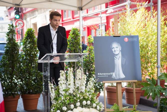 Charles Aznavour memorial plaque inaugurated at first Paris apartment building of Aznavour 
family