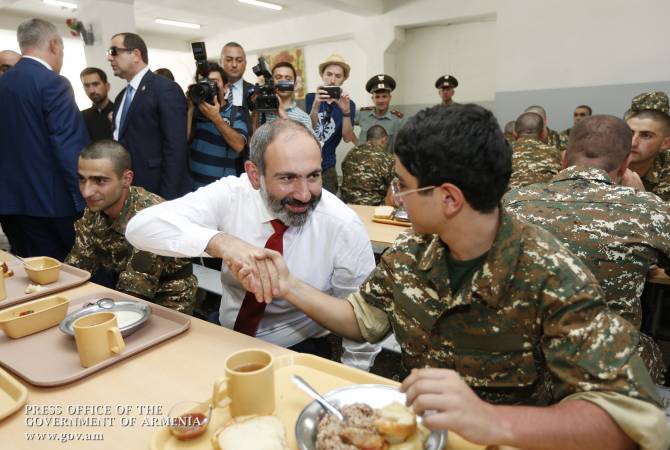 PM personally tests food quality during visit to military unit