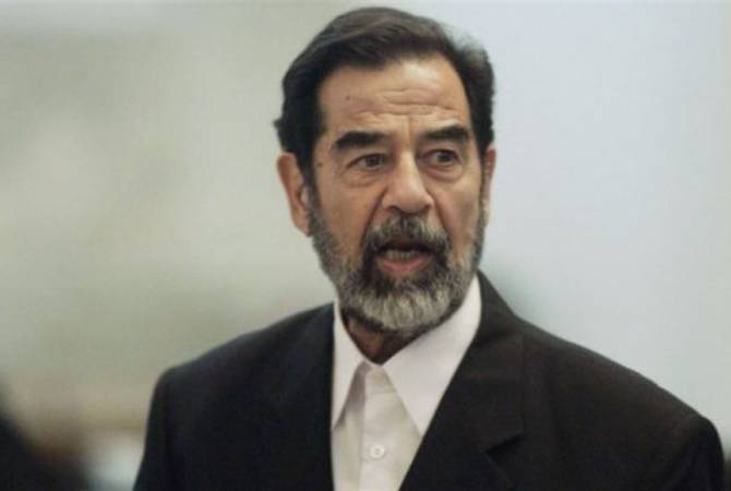 Iraqi lawmaker proposes to hang photo of handcuffed Saddam Hussein in parliament, 
government seats 