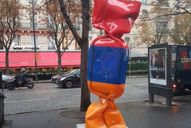 Candy sculpture with colors of Armenian flag placed on Avenue George V of Paris