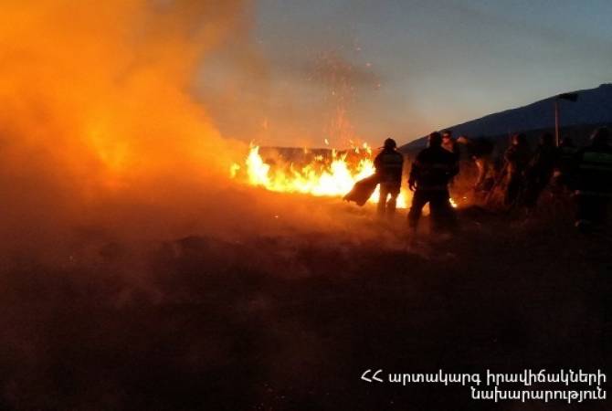 Armenian firefighters, Russian border troops join forces to tackle cross-border wildfire from 
Turkey