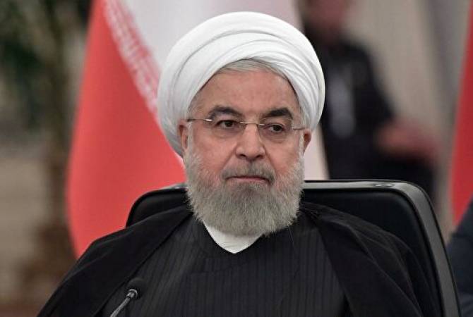 Iranian president apologizes for delayed plane crash admission