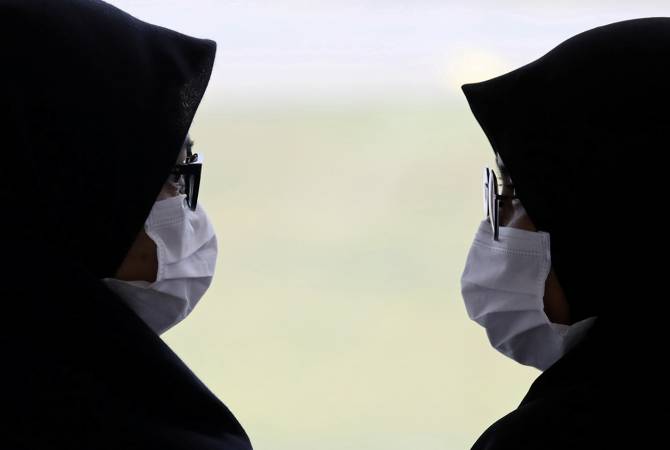 Фабрика на юге КНР начала ежедневно выпускать 1,2 млн медицинских масок