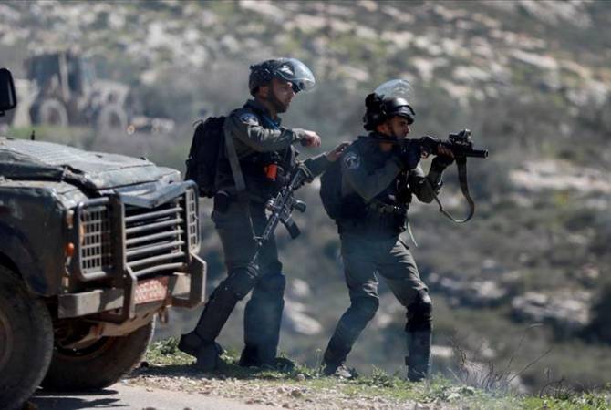 Два палестинца были ранены израильскими военными на Западном берегу
