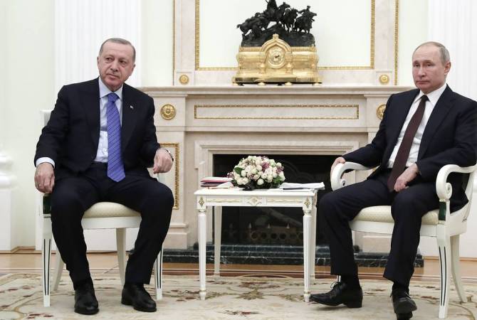 Putin talks with Erdoğan, expresses deep concerns over involvement of militants from Middle 
East