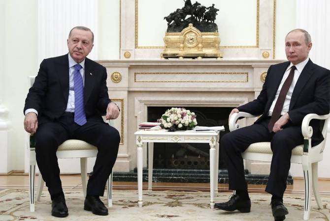 Putin talks with Erdoğan, expresses deep concerns over involvement of militants from Middle 
East