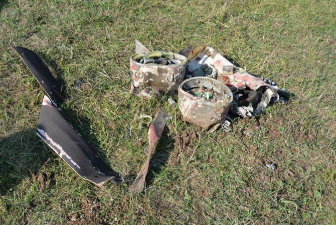 Artsakh bomb squads discover Azeri-fired cluster missile warhead with 260 bomblets in FARM