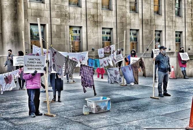 Blood-soaked laundry art installation raises awareness on Artsakh in Canada 