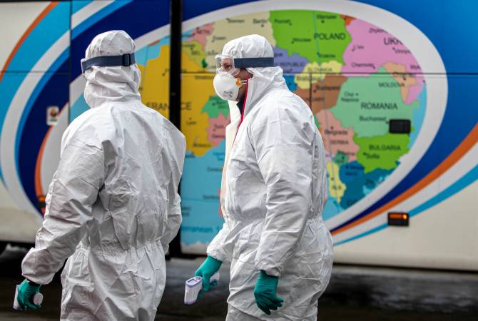 Merkel, Macron et d'autres politiciens appellent à un "dialogue mondial" à la lumière de la 
pandémie
