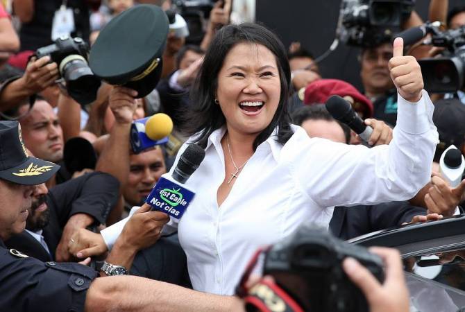  Кейко Фухимори побеждает на выборах президента Перу 