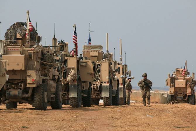 СМИ: американская военная автоколонна подверглась нападению в Сирии
