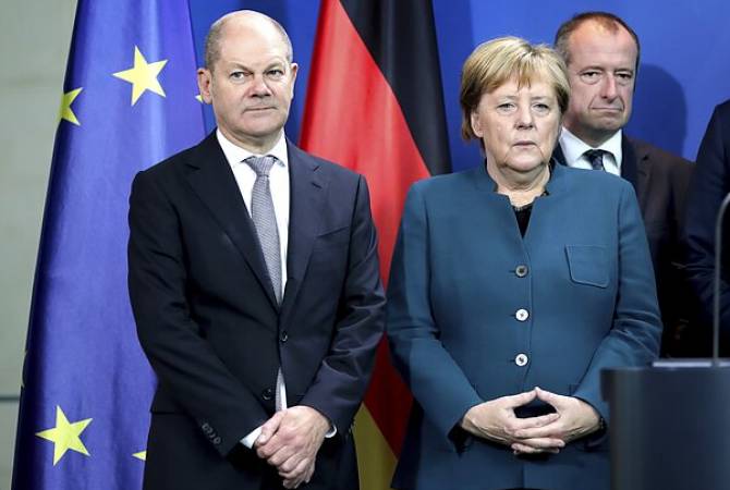 Меркель передала дела новому канцлеру Германии

