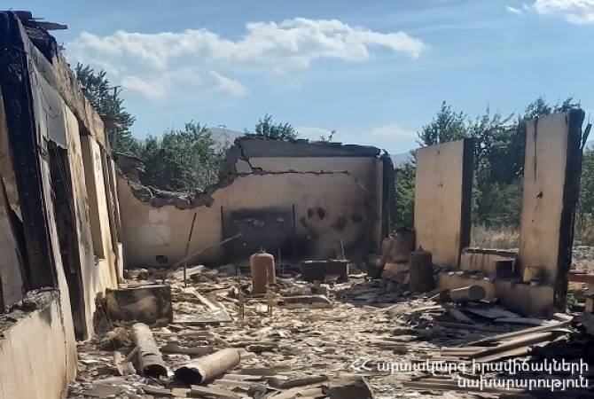 Village barn ablaze from Azeri bombing in Armenia