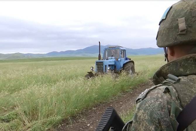 Nagorno Karabakh farmers urged to work in presence of Russian peacekeepers amid 
threat of Azeri shootings 