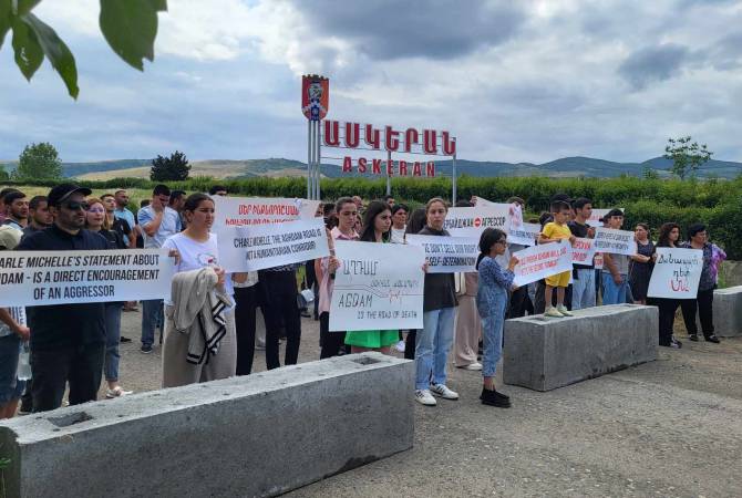 Azeri 'aid' is actually blackmail and attempt to subjugate us,Nagorno Karabakh 
demonstrators say after closing Akna road