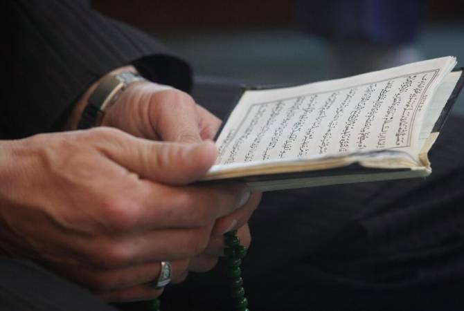 Denmark's parliament adopts a law making it illegal to burn religious texts