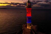 Chania lighthouse, Alexandroupolis City Hall lit up in Armenian flag colors 
