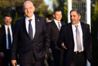 FIFA President Gianni Infantino congratulates Armen Melikbekyan on re-election