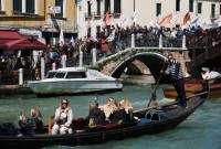 Overcrowded Venice begins charging day-trippers for access