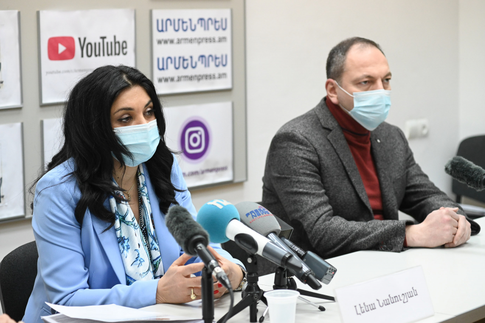 First Deputy Health Minister Lena Nanushyan, healthcare expert and member of the task force for universal insurance Samvel Kharazyan deliver press briefing