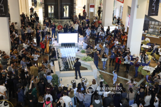 Armenian National Philharmonic Orchestra's surprise 
performance for shoppers in Dalma Garden Mall